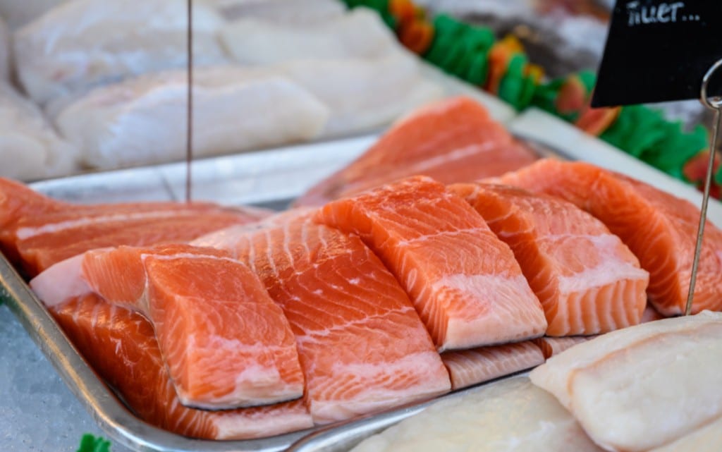 Sultan Rashid Abdullah Rashid Al Shene — Al Shene Marine Holding — premium salmon fillets on ice for market